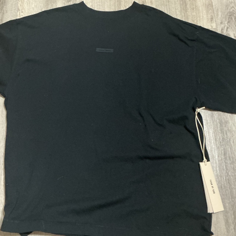 Black essential brand shirt